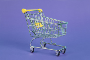 shopping cart on purple background