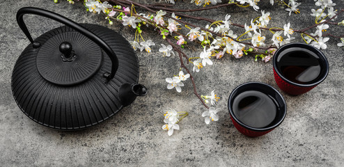Japanese iron teapot on a grey stone board