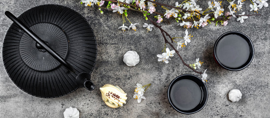 Japanese iron teapot on a grey stone board
