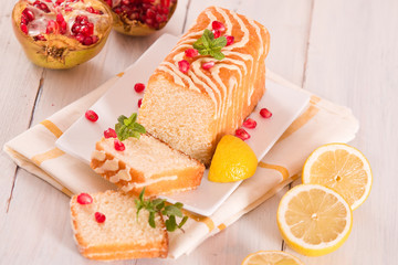 Lemon sponge cake with pomegranate.