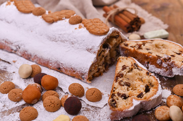 Traditional German Christmas pastries, miscellaneous cookies and chocolate for the holiday. Christmas stollen
