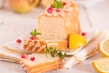 Lemon sponge cake with pomegranate.