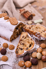 Traditional German Christmas pastries, miscellaneous cookies and chocolate for the holiday. Christmas stollen