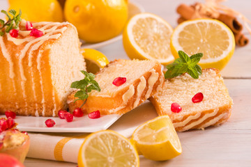 Lemon sponge cake with pomegranate.