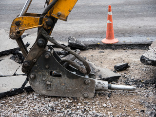 Pneumatic jackhammer with hoses and drive side view