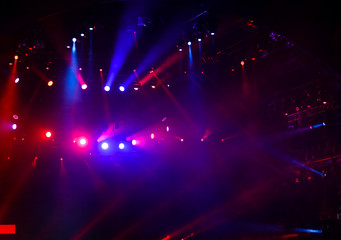 Fototapeta na wymiar Purple light on a rock concert stage as background