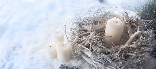 Burning candles in winter