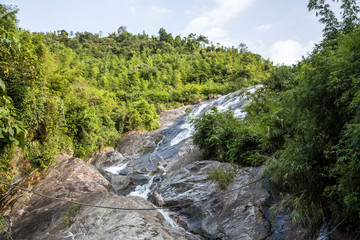Naklejka na ściany i meble Beautiful waterfall in Sa Pa. Vietnam
