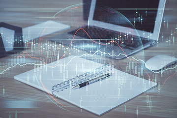 Multi exposure of graph and financial info and work space with computer background. Concept of...