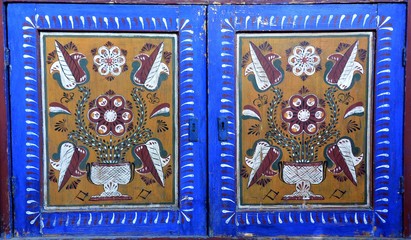 traditional peasant drawings on the objects in the house