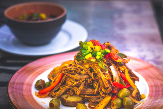 Ropa Vieja Shredded Flank Steak, Vegetable In Tomato Sauce And Arroz Moro