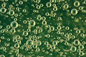 Small and Large Oxygen Bubbles in Green Liquid