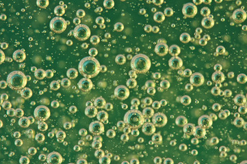 Small and Large Oxygen Bubbles in Green Liquid