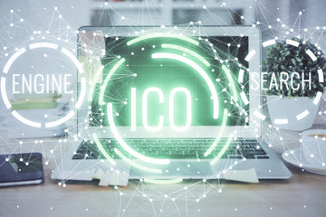 Multi exposure of blockchain theme hologram and table with computer background. Concept of bitcoin...