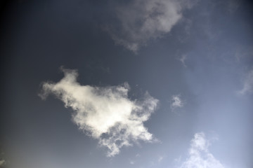 white clouds on black background.