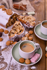 A traditional Dutch holiday for children of Sinterklaas. Winter holidays in Europe and the Netherlands. Stollen with cranberries and icing sugar. A form for writing text and aromatic coffee.