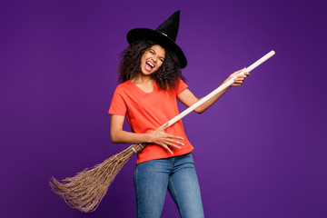 Photo of curly wavy cheerful nice brown haired girlfriend witch playing broomstick guitar imagining...