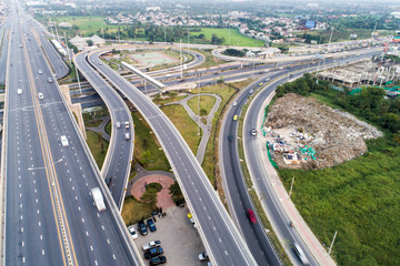 Fototapeta premium City transport road with vehicle movement surround by village