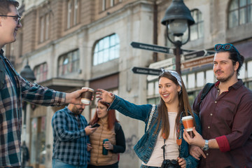 Group of tourists sightseeing the city