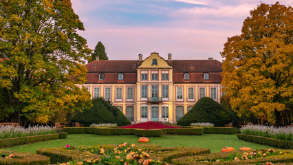 Abbots Palace in the rococo style and located in Oliwa Park in autumn scenery.. Gdansk, Poland.