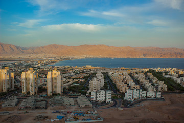 Obraz premium top view aerial photography of the most south Israeli city Eilat near Gulf of Aqaba Red sea bay with Jordanian desert and mountain background 