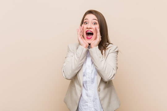 Young Business Woman Shouting Excited To Front.