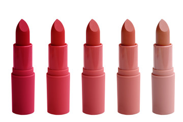 set of matte lipstick on a white isolated background, red, raspberry, pink, coral, peach color, close-up, the concept of decorative cosmetics