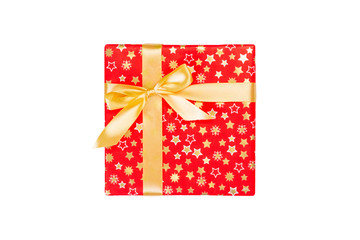 Christmas or other holiday handmade present in red paper with Gold ribbon. Isolated on white background, top view. thanksgiving Gift box concept