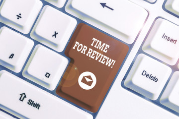 Conceptual hand writing showing Time For Review. Concept meaning formal assessment of something with intention instituting change White pc keyboard with note paper above the white background