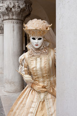 Female carnival mask in Piazza San Marco in Venice during the carnival. Italy