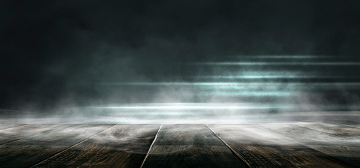 Background of empty dark scene with wooden old floor. Neon light smoke. Dark abstract background