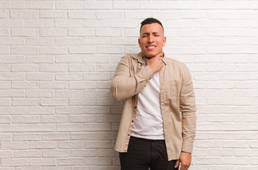 Obraz premium Young latin man coughing, sick due a virus or infection