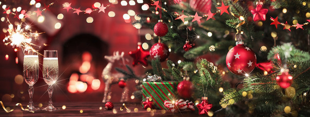Fototapeta na wymiar Christmas Tree with Decorations and Champagne 