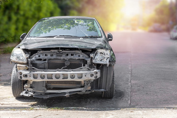 Front of black color car damaged and broken by accident . Isolate on white background. Save with...