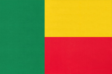 Republic Benin national fabric flag textile background. Symbol of world african country.