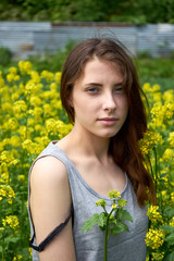 portrait of a girl with yellow flowers