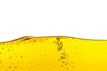 Beautiful wave of high viscosity of base oil and air bubble inside the oil isolated on white background, used as wallpaper, industrial concept