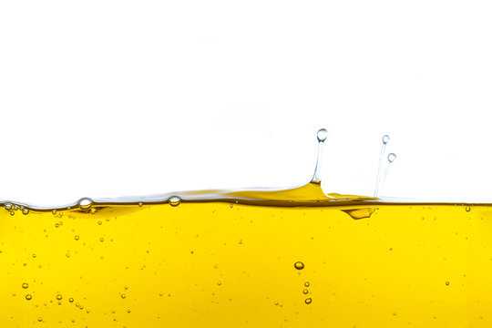 Beautiful wave of high viscosity of base oil and air bubble inside the oil isolated on white background, used as wallpaper, industrial concept