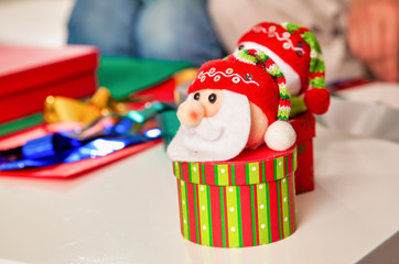 Family at home with Christmas gift boxes