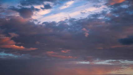 Sky at sunset with colorful clouds. Magic shine
