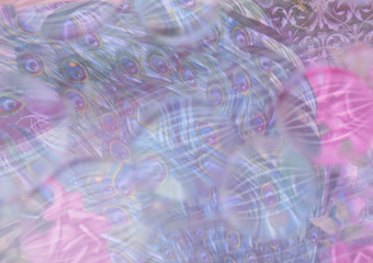 Soft focus background in pastel shades of blues, lilacs and pinks. Patterns of spheres, stripes, and peacock feathers.