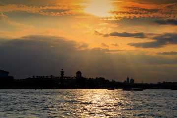 View of evening St. Petersburg, the Arrow of Vasilievsky island. Sunset over the historic city.