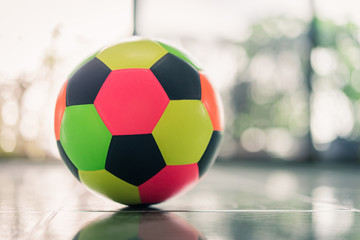 Colorful football in kids room.