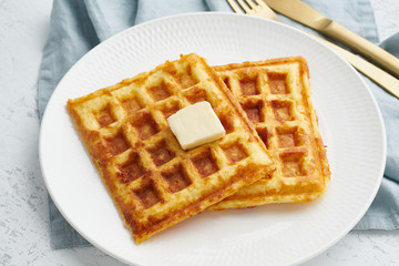 Chaffle, ketogenic diet health food. Homemade keto waffles with egg, mozzarella cheese. Gluten - free and carb-free. White background.