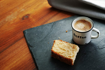 Cup of coffee with cake