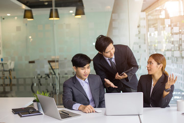 Start up concept,Start-up Asia business team in meeting and helped analyze the marketing problems of the company or beginning new project