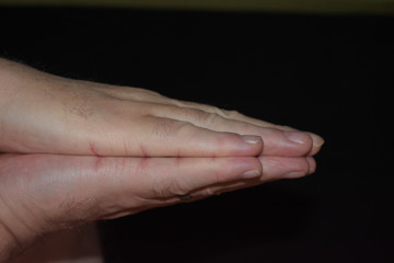 Hand Gesture Showing a Praying Position