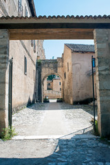 Fototapeta na wymiar Cloister entrance inside the charterhouse of Padula, Salerno, Italy