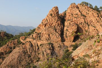 Fototapeta na wymiar Red Rocks in Corsica Island called Calanches of Piana