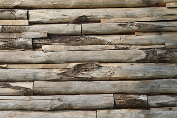 wooden planks of a wall of an hut in mountains